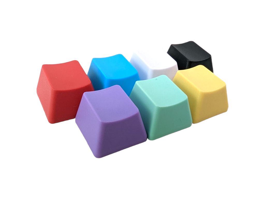 What are the different types of materials used to make mechanical keyboard keycaps?