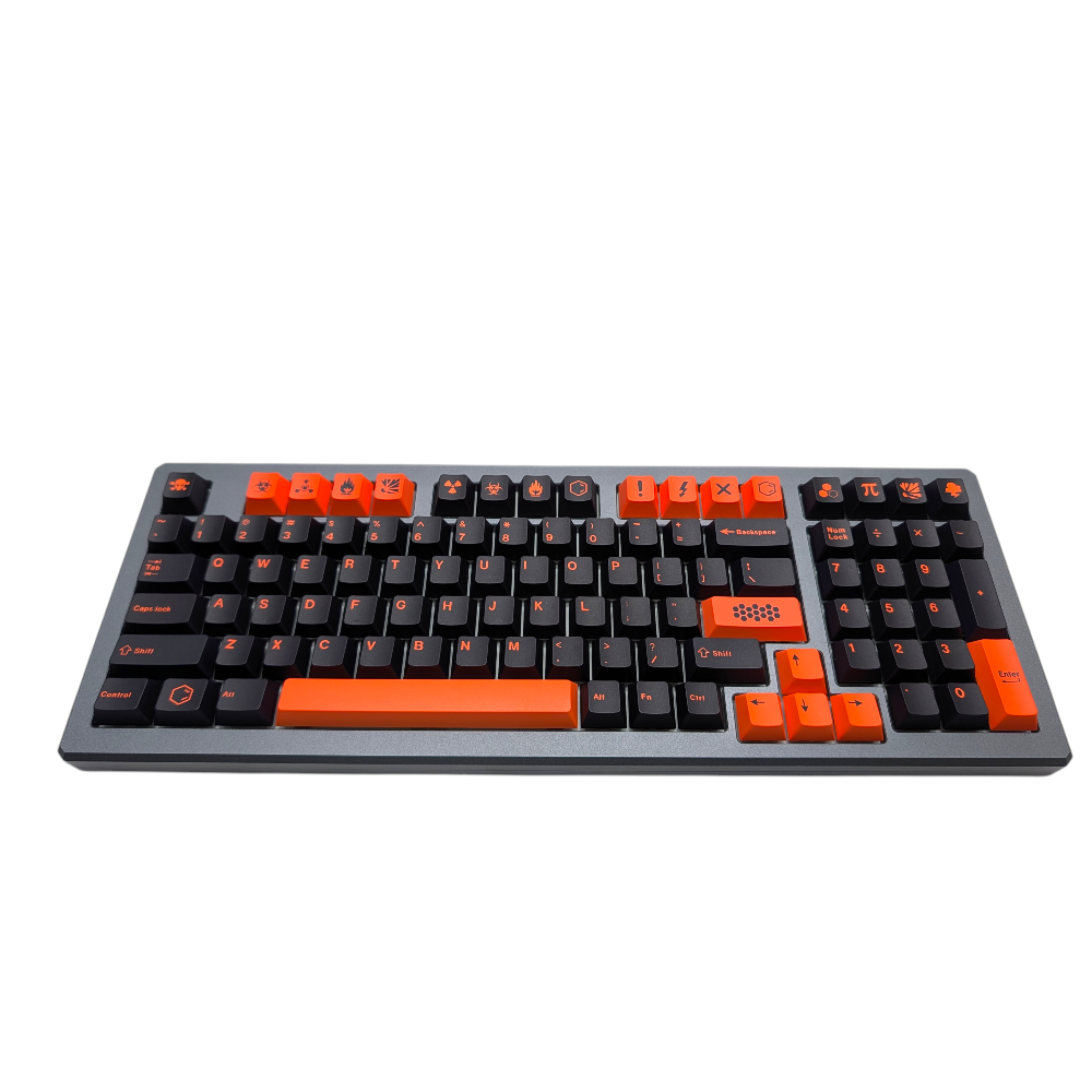 Apex Ignition" keycaps installed on a grey mechanical keyboard, emphasizing the black and orange contrast.