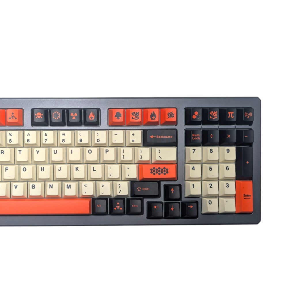 A compact mechanical keyboard with a dark gray frame, cream-colored keycaps, and orange accent keycaps and legends, shown from a top-down angle on a white background.