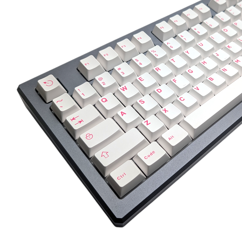 Angled view of 133-piece "Clean Pink" set showcasing Cherry MX profile on a custom keyboard.