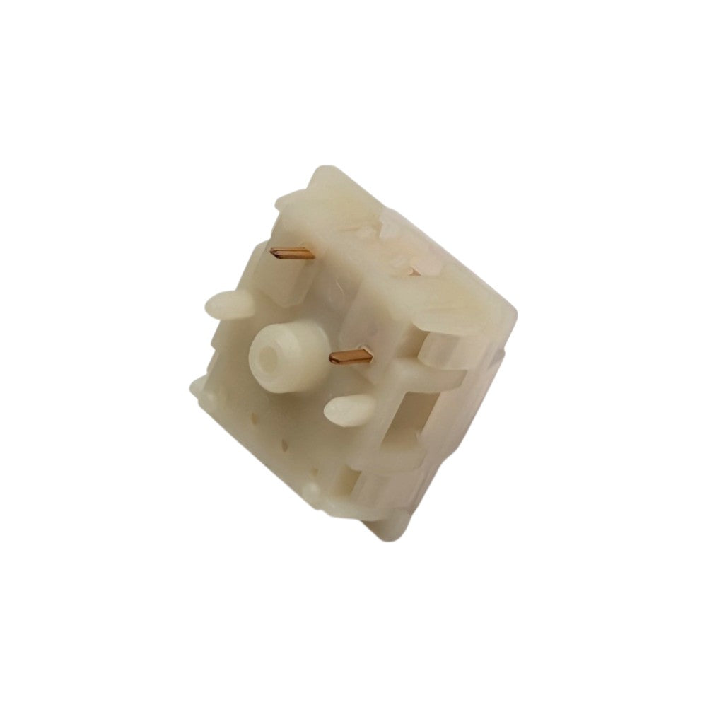 Bottom angled perspective shot of Gateron Milky Pink Pro switch showing PCB mounting legs and central stem hole.