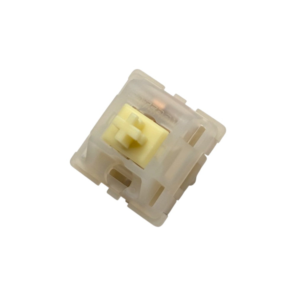 Side perspective view of Gateron Milky Yellow Pro heavy tactile switch highlighting housing latches and stem profile.
