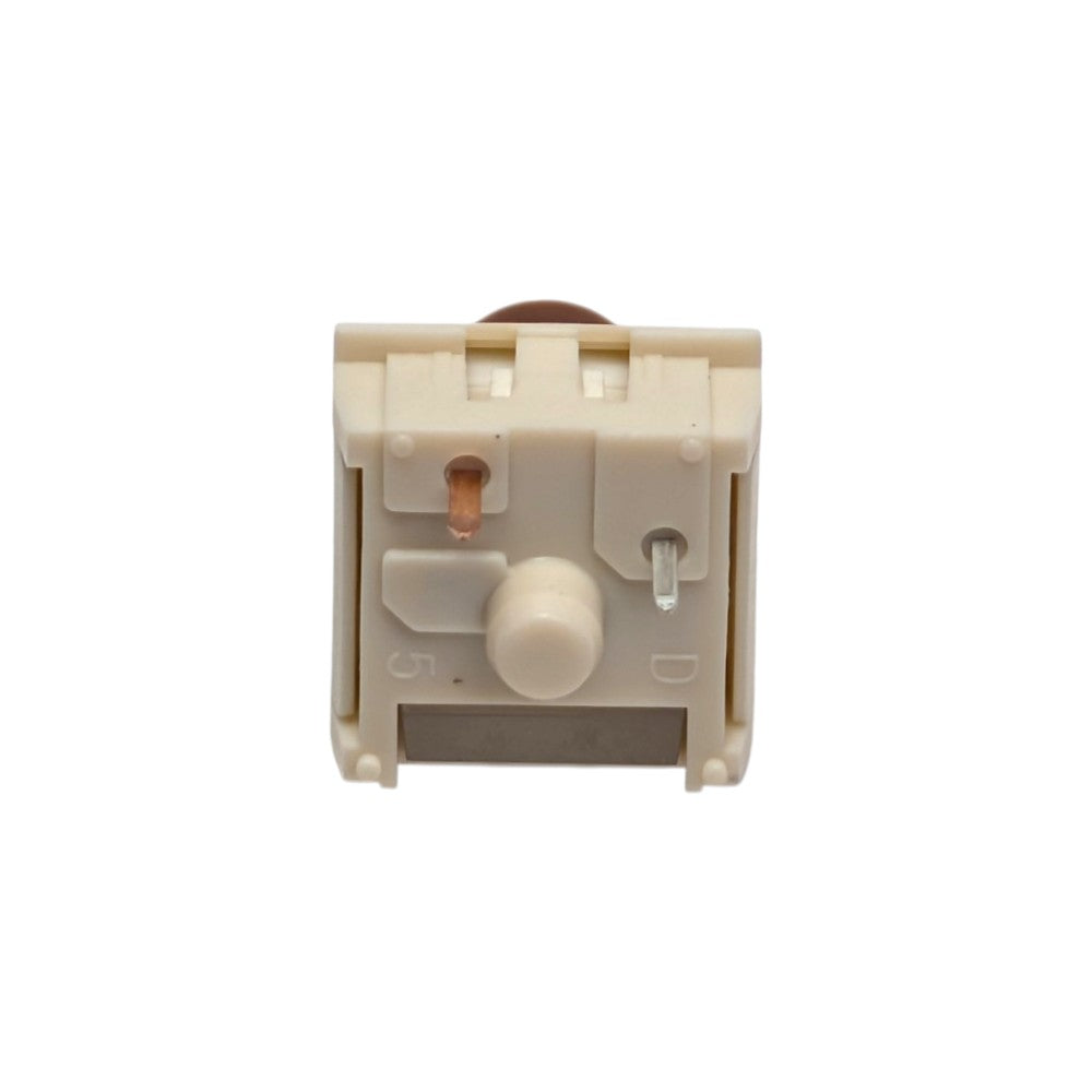 Directly overhead view of the 5-pin cream bottom housing and metal contact pins on Kailh Box Cream Pro switch.