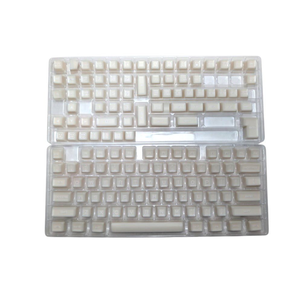Full 130-piece Thock King Milky Marshmallow SA keycap kit laid out off the keyboard.