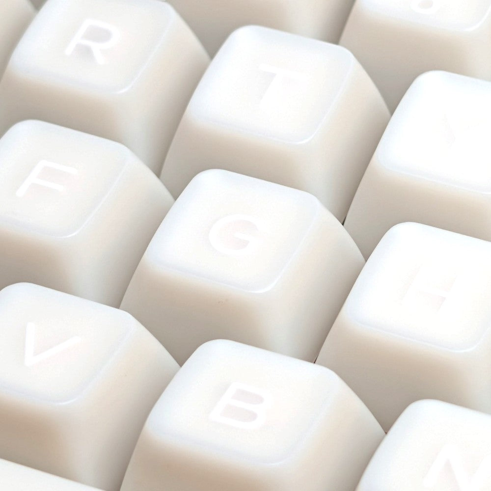 Close-up of the doubleshot legends on Thock King Milky Marshmallow SA keycaps.
