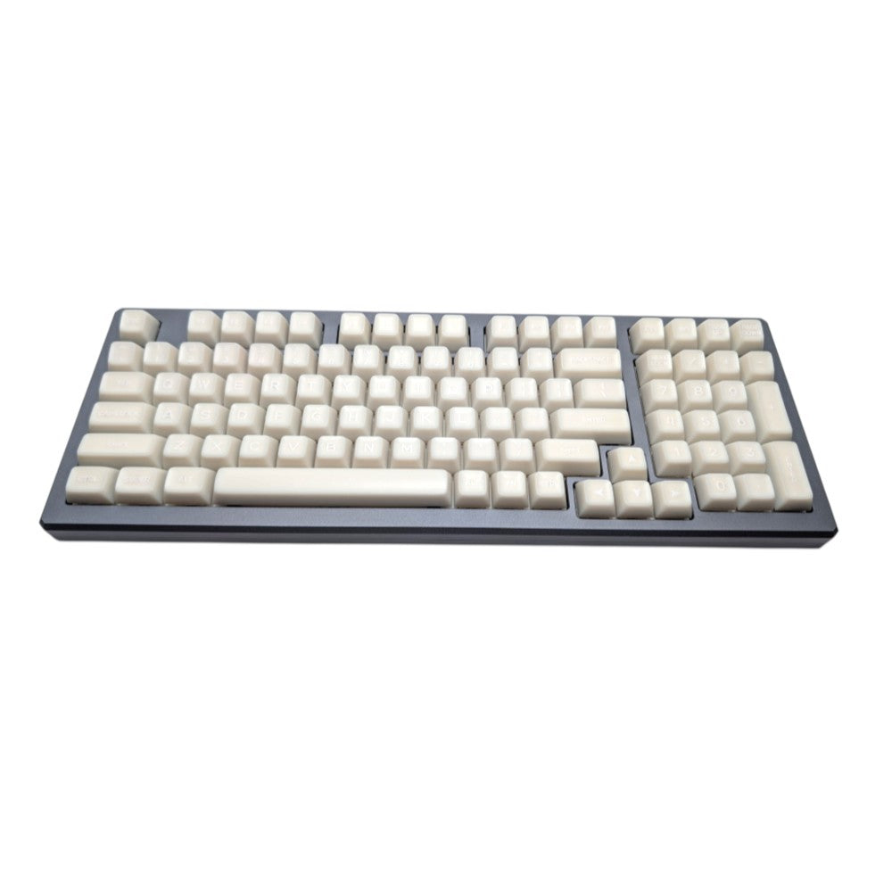 Top-down view of Thock King Milky Marshmallow SA keycaps across a full keyboard.