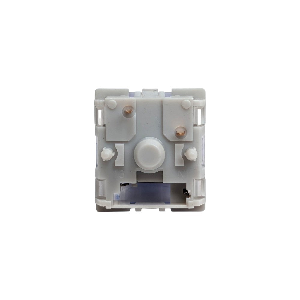 Directly overhead view of the 5-pin off-white bottom housing and metal contact pins on TTC Brother V2 switch.