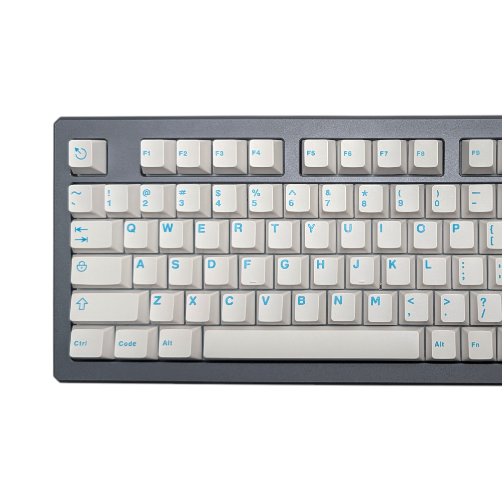 Detailed view of Aqua Clarity keycaps, emphasizing the clean contrast and legend design.