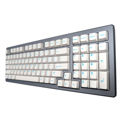 Overhead shot of durable ABS double-shot keycaps in the Aqua Clarity colorway.