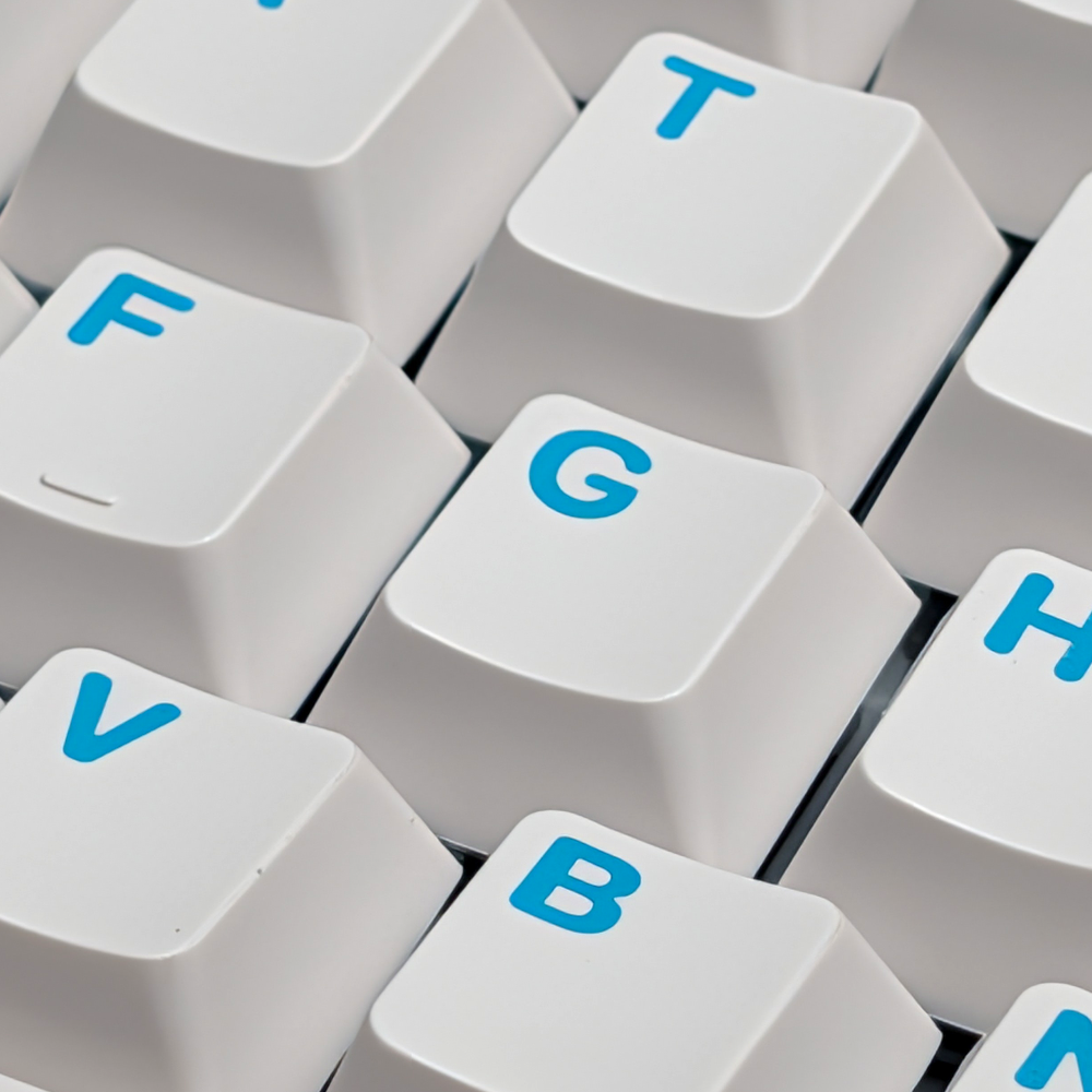 Mechanical keyboard featuring Aqua Clarity keycaps, emphasizing crisp aesthetic and design.
