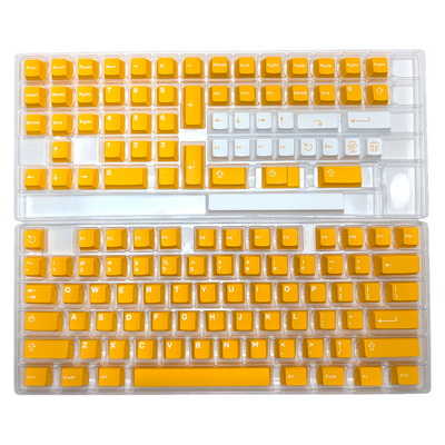 Overhead shot of durable ABS double-shot keycaps in Midas Touch Gold  yellow colorway.