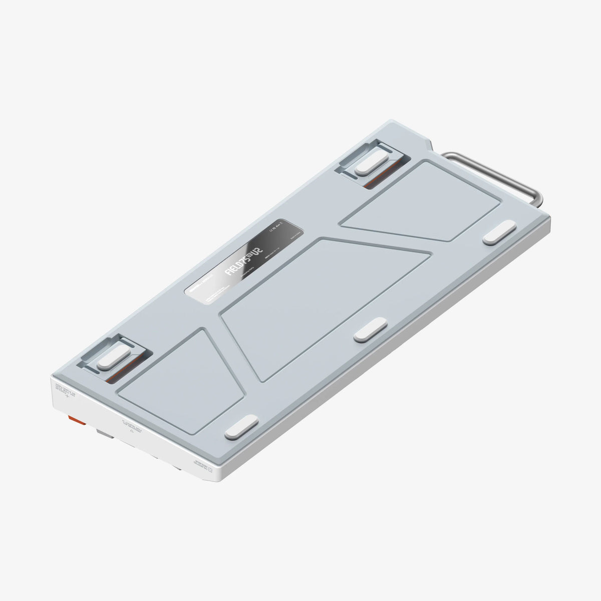 A slim rectangular electronic device with a light gray top cover, metallic silver edges, and a small display window, shown at an angle on a plain light gray background.