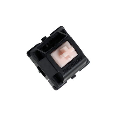 Side view of a Gateron Oil King Pink silent linear switch showing the mute ring on the stem rail.