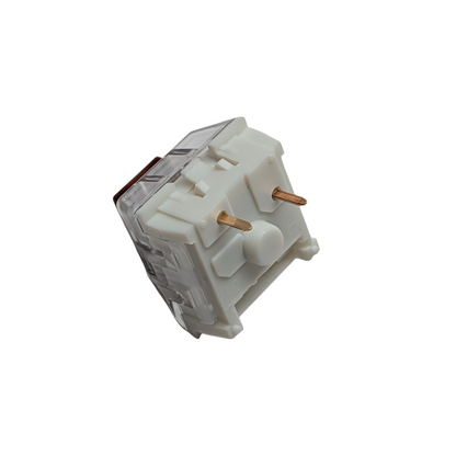 Bottom view of a 3-pin Kailh Box Brown tactile switch showing the gold-plated contact points and central mounting post for universal MX-style PCB compatibility.