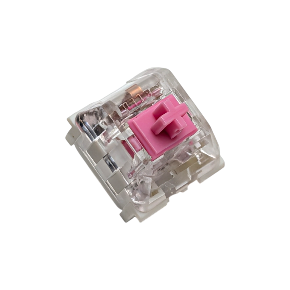 Extreme close-up of a Kailh Speed Pink switch with a transparent top housing designed to maximize SMD LED RGB shine-through on custom gaming keyboards.