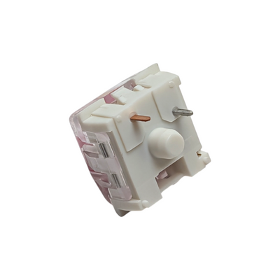 Close-up of Kailh Speed Pink mechanical switches showing the 1.1mm short actuation travel design, ideal for fast-paced gaming and rapid keystroke response.