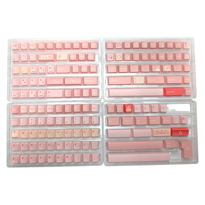 op-down view of a mechanical keyboard featuring various shades of pink keycaps.