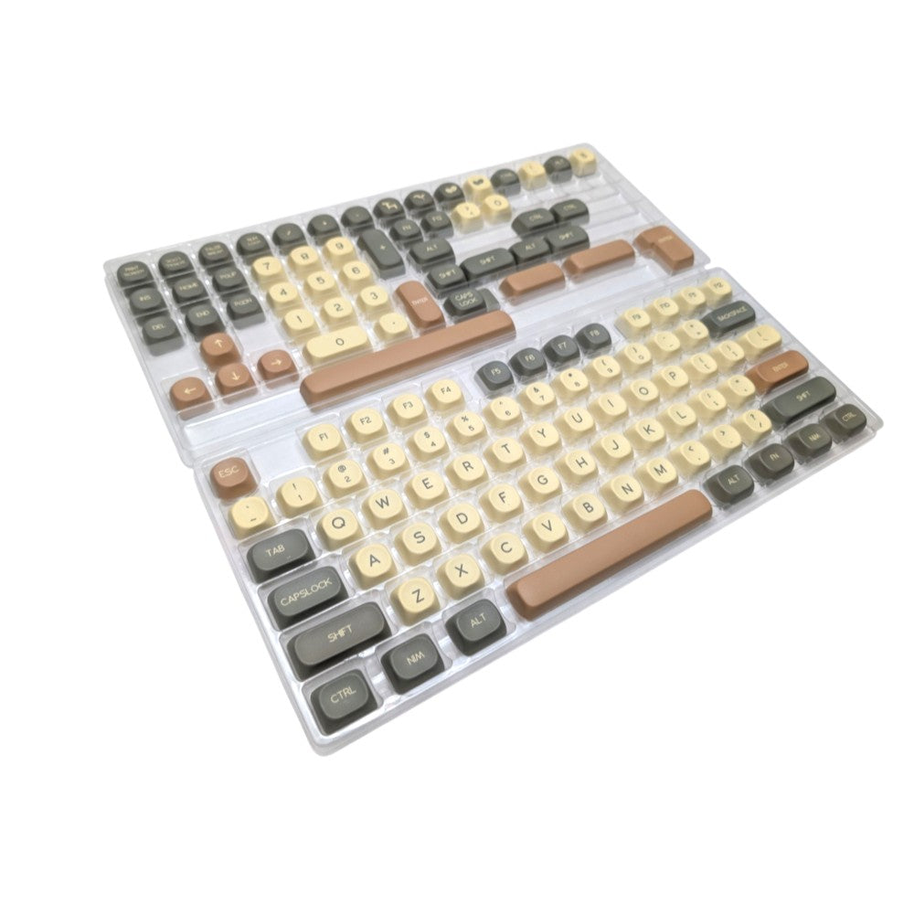 Perspective view of storage trays holding the 130-key Hojicha Matcha Latte MOA PBT keycap set.