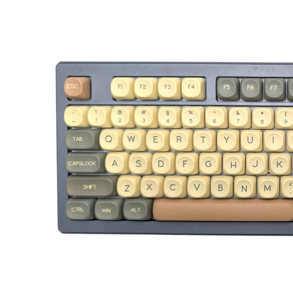 Close-up view of Hojicha Matcha Latte MOA profile PBT keycaps installed on a mechanical keyboard.