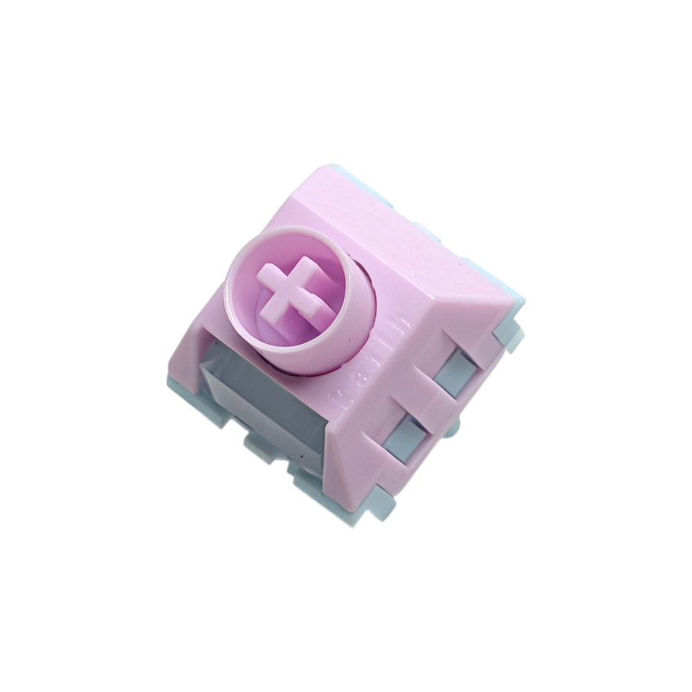 Macro shot of Kailh Box Saker Linear Gaming Switches for custom mechanical keyboards showing the cream-colored POM stem.