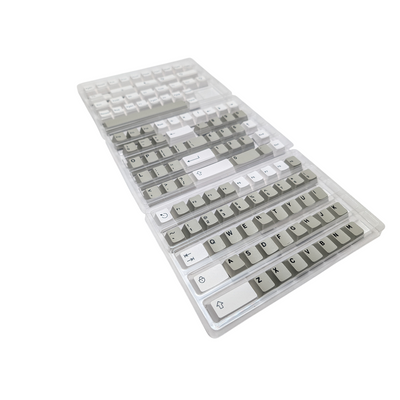 Close-up of space gray and pure white ABS double-shot keycaps.