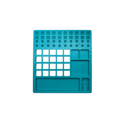 Top-down view of teal plastic lube station showing layout for 20 switch housings, 30 stems, 20 springs, and storage compartments.
