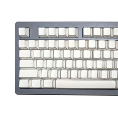 A close-up of a mechanical keyboard with white keycaps and a dark gray frame, shown against a plain white background.