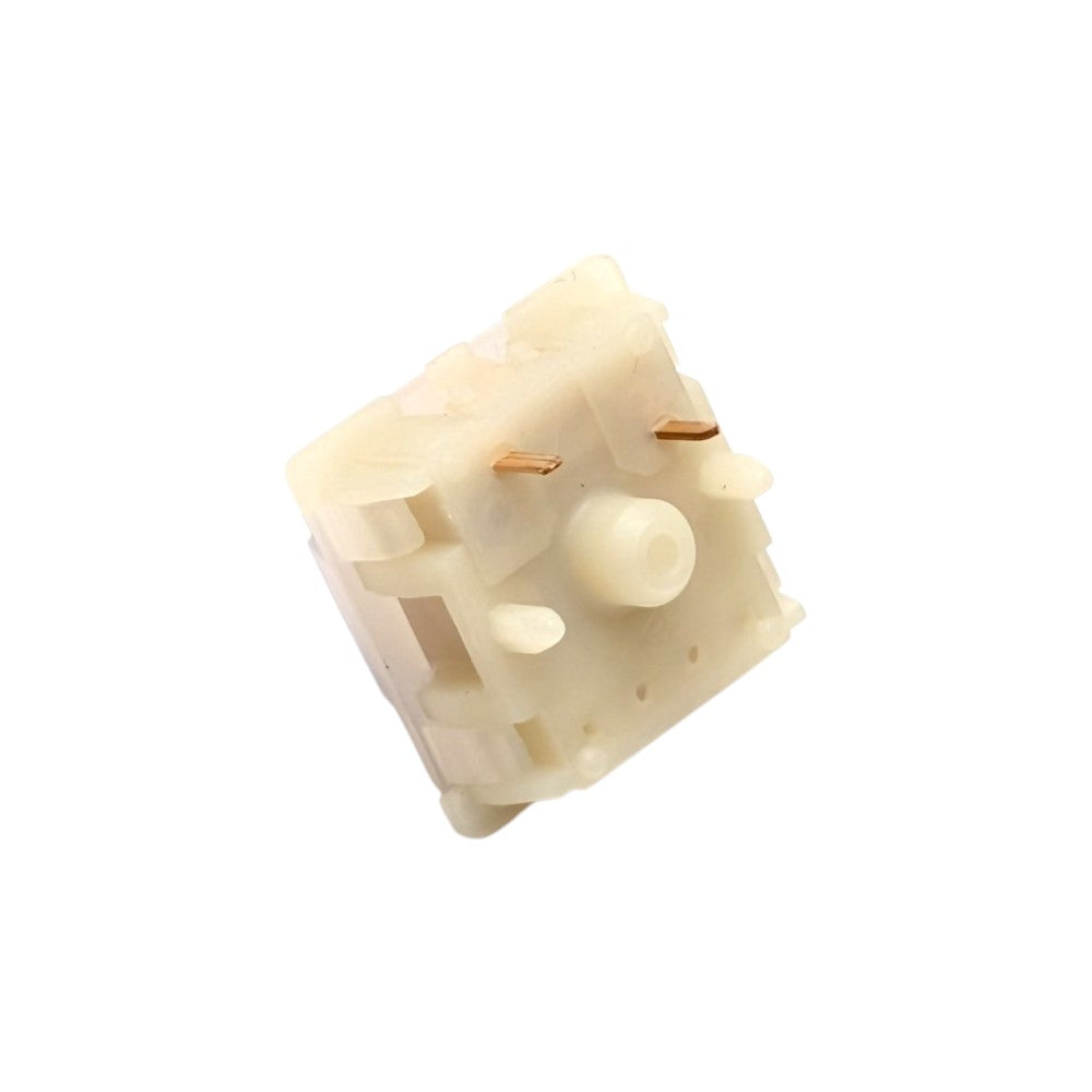 Bottom angled shot of Gateron Milky Purple Pro switch highlighting PCB mounting legs and stem pole orifice.