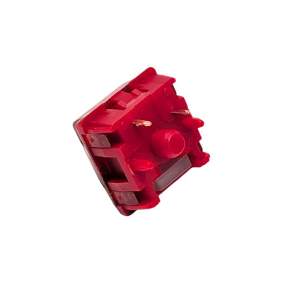 Bottom angled perspective shot of the HMX x JKDK Blossom linear switch displaying 5-pin legs and stem pole orifice.
