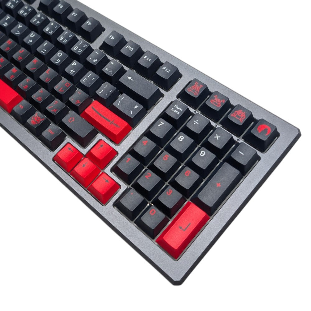 Close up of red samurai helmet and armor novelty keycaps included in Thock King Bushido set.