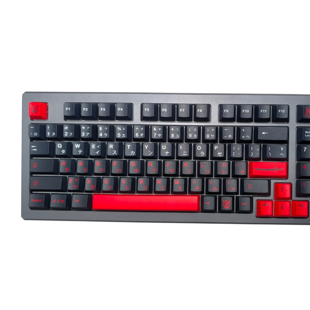 Macro view of clean dye-sublimated split white and red katakana legends on Thock King PBT keycaps.