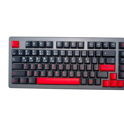 Macro view of clean dye-sublimated split white and red katakana legends on Thock King PBT keycaps.