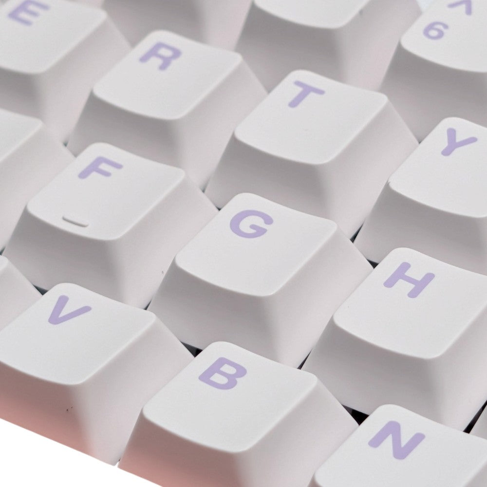 Macro detail shot of crisp purple dye-sublimated legends on white PBT keycaps of Leobog Hi8.