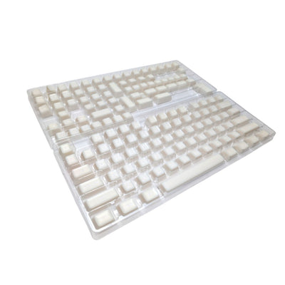 Angled view of Thock King Milky Marshmallow SA keycaps on a dark keyboard.
