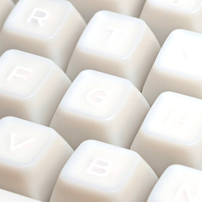 Close-up of the doubleshot legends on Thock King Milky Marshmallow SA keycaps.