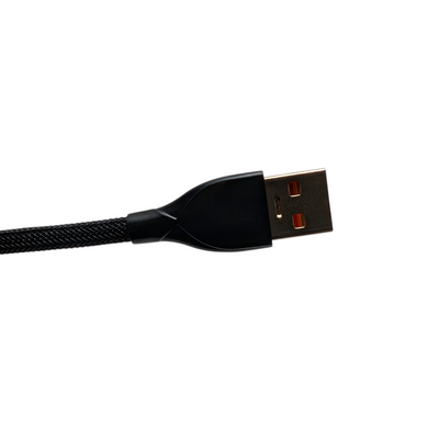 Side view of an Onyx Orange coiled USB cable for gaming keyboards, highlighting the heavy-duty metal housing and orange Techflex mesh.