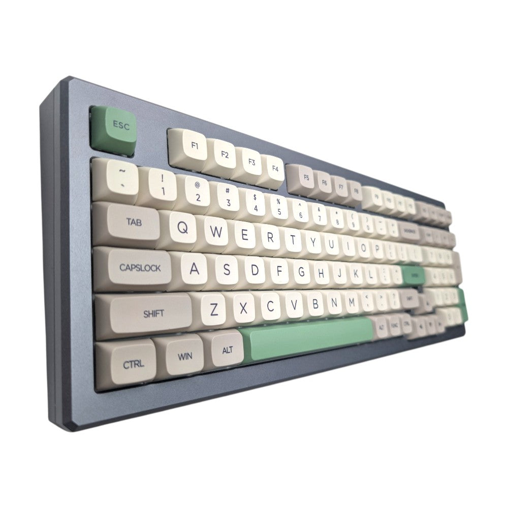Thock King Retro 9009 PBT XDA keycaps with green accent modifiers installed on custom mechanical keyboard.