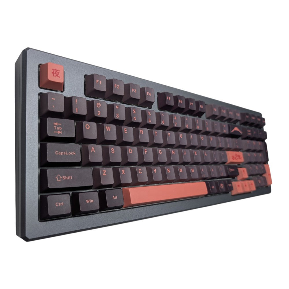 Thock King Yoru Sakura PBT keycaps in dark purple and salmon pink installed on mechanical keyboard angled view.