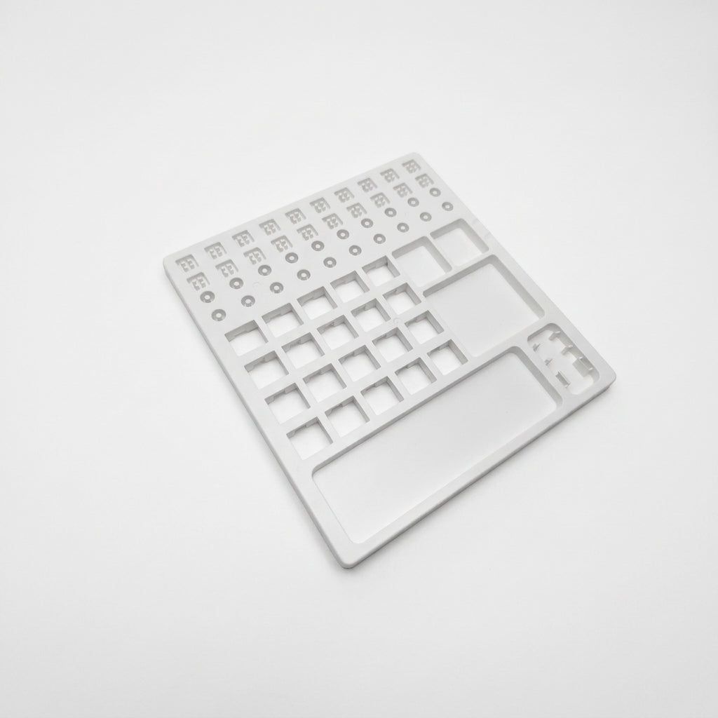 Perspective view of white plastic switch lube station tray for mechanical keyboard tuning