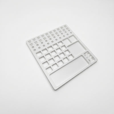 Perspective view of white plastic switch lube station tray for mechanical keyboard tuning